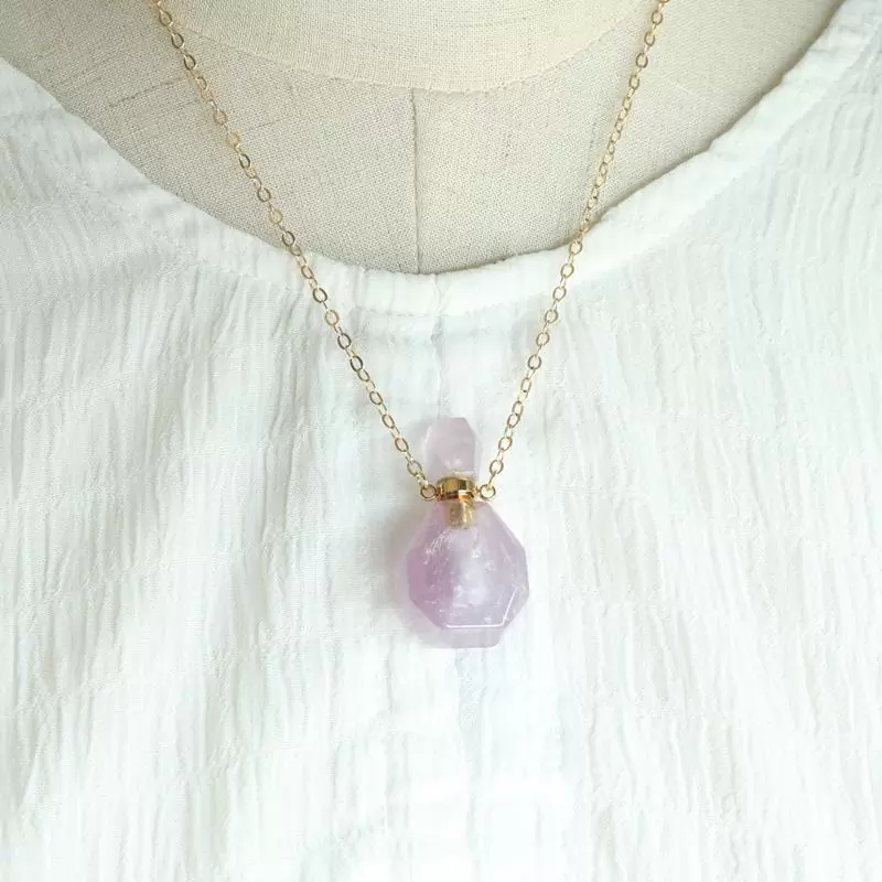 crystal pendant with oil bottle showing